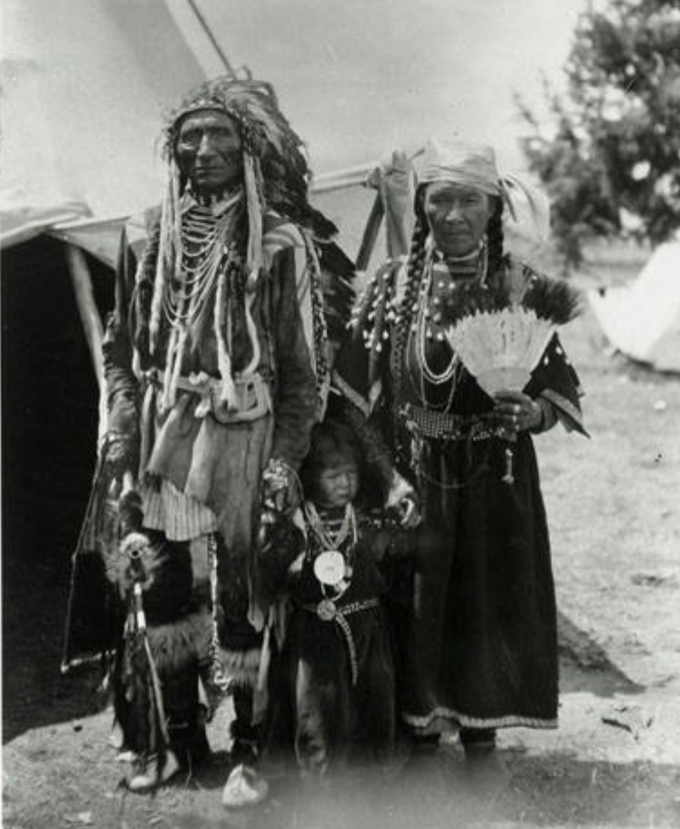 Joe Lamoose with his wife and child