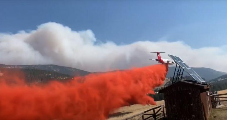 Plane drops flame retardant on Middle Fork