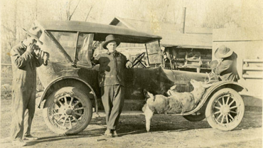 Tellier photo of deer and Buick